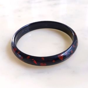 NWT. 0.5" Wide Black with Painted Hearts Bangle Bracelet.